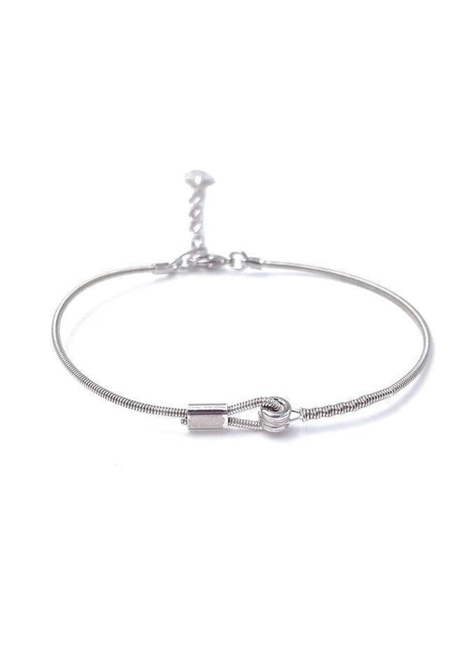 Bracelet En Corde De Guitare Avec Fixation Entrelacée Argent