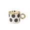Taza de lunares negros